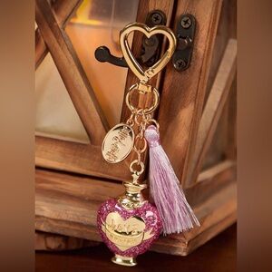 Harry Potter Heart Shaped love potion with Tassel bag charm